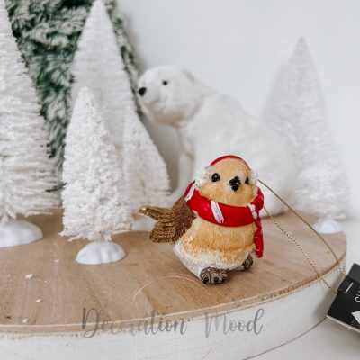 Madárka fülvédővel